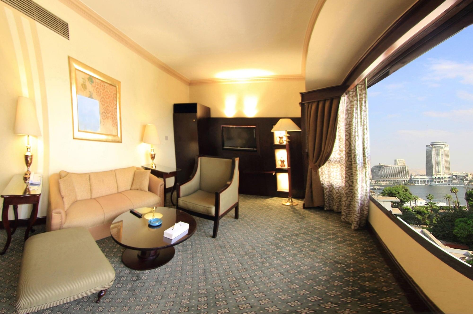 Pyramisa Suites Hotel Cairo Giza Exterior photo A room at the hotel